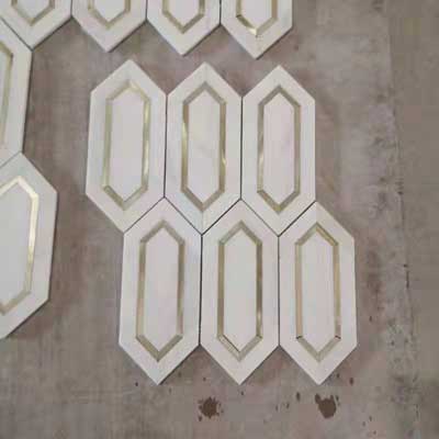 Dolomite and metal picket mosaics
